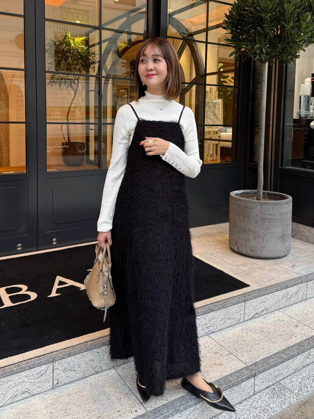 袖ボタンハイネックニット / アイボリー